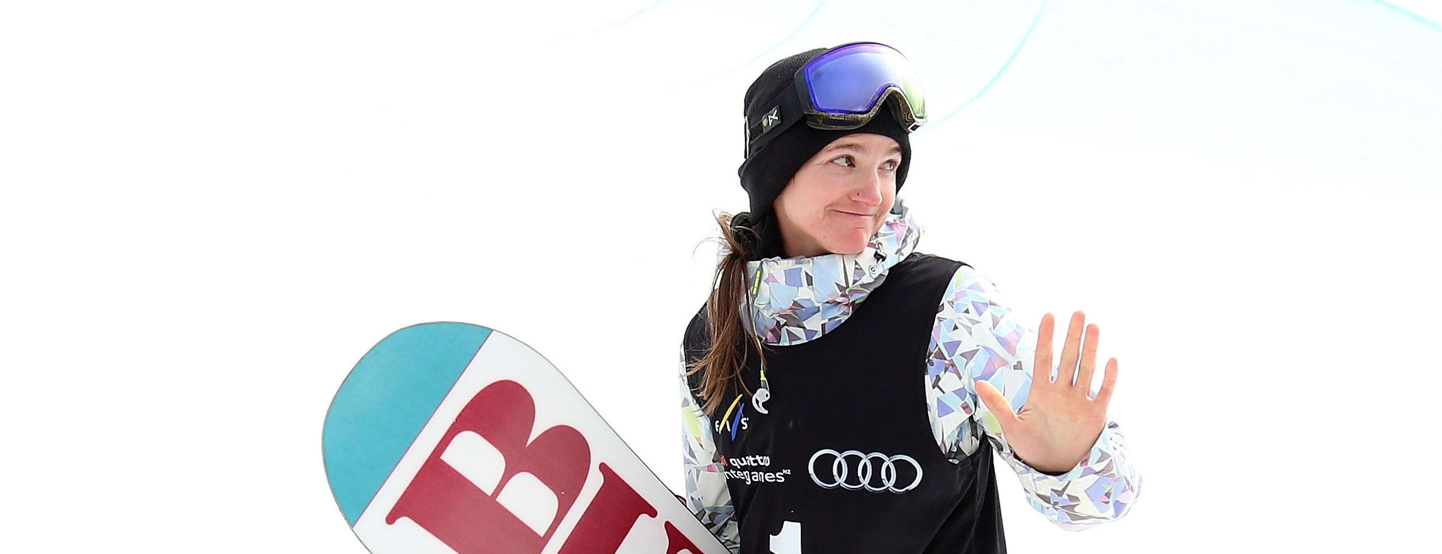 Kelly Clark waves to the crowd in the FIS Snowboard World Cup Halfpipe Finals