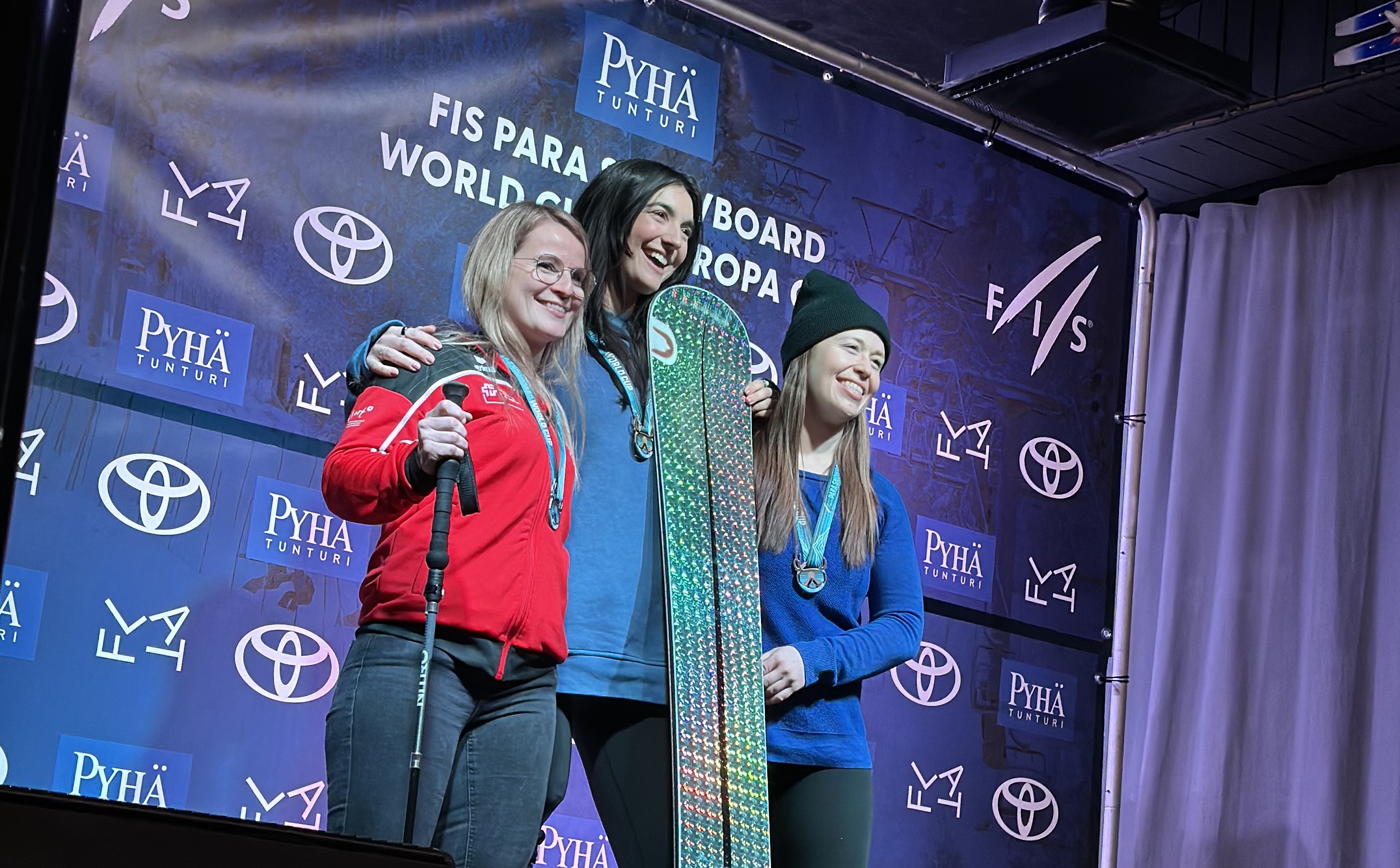 Brenna Huckaby and Dennae Russell of the U.S. stand on the podium in Pyhä