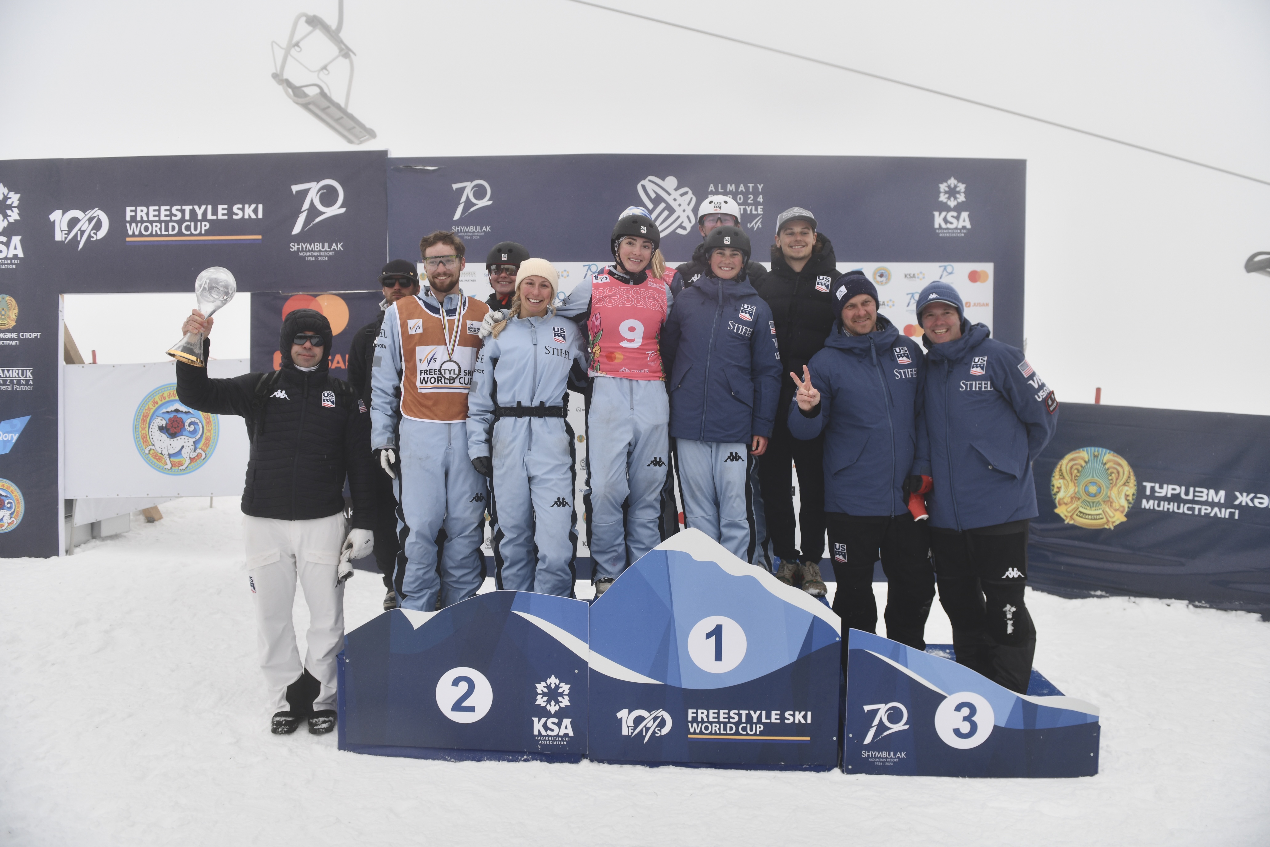The Stifel U.S. Freestyle Ski Team aerials athletes on the podium after winning the 2023-24 Nations Cup