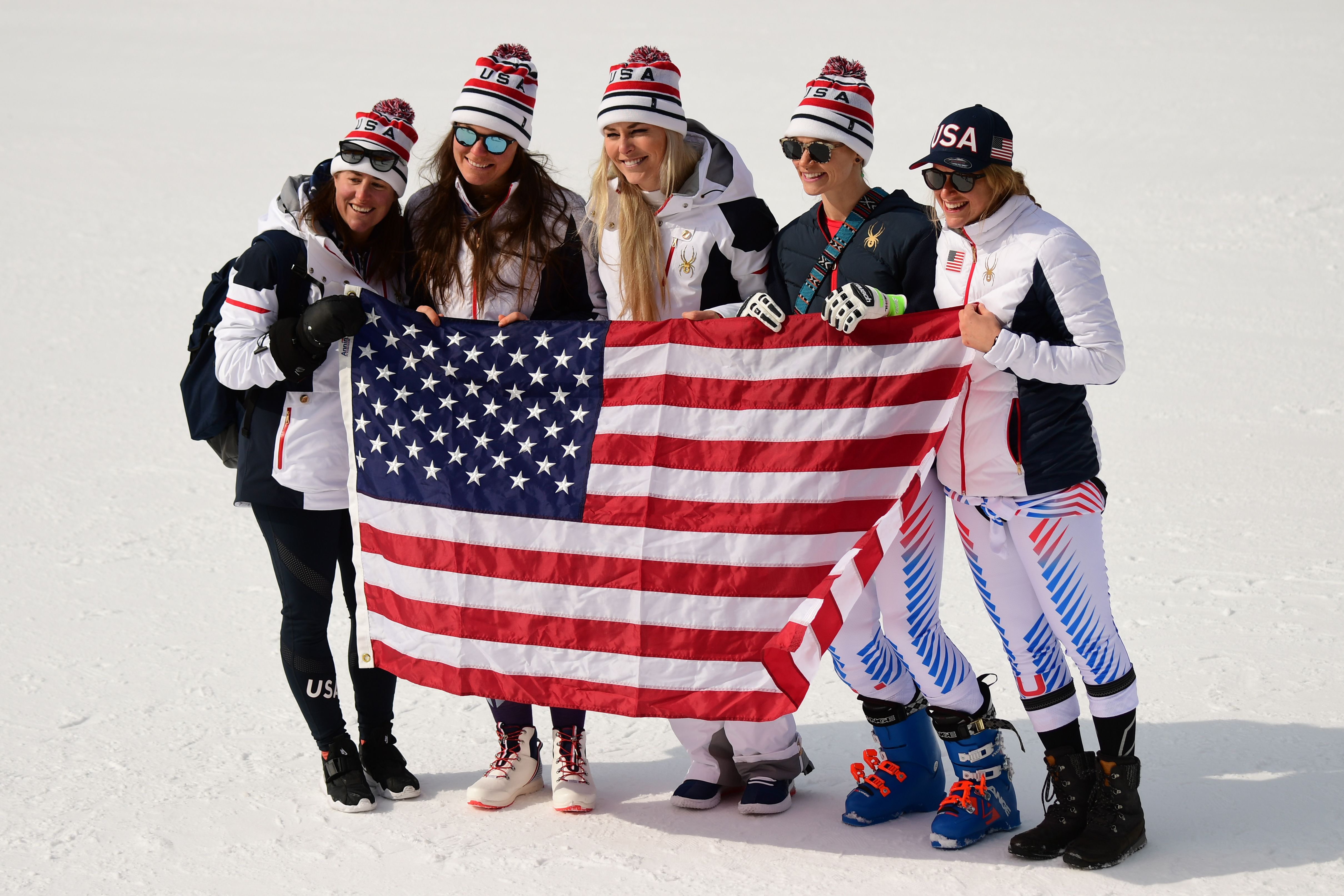 The women's speed team celebrates four in the top 15 on downhill day at the Winter Olympics in PyeongChang, South Korea.