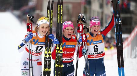 Jessie Diggins celebrates her first World Cup cross country classic sprint podium Wednesday in Drammen, Norway. Stina Nilsson of Sweden (left) was second, and Maiken Caspersen Falla of Norway took the victory. (Getty Images/AFP -  Terje Pedersen)