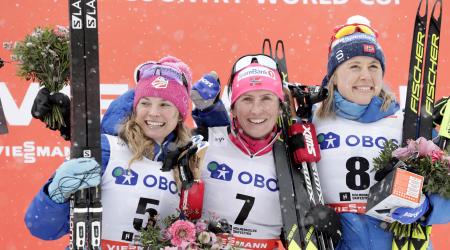 Jessica Diggins finished second in Sunday’s 30k mass start freestyle. Norway’s Marit Bjoergen (center) won and Ragnhild Haga was third. (Getty Images/AFP - Berit Roald)