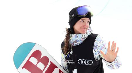 Kelly Clark waves to the crowd in the FIS Snowboard World Cup Halfpipe Finals