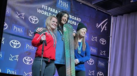 Brenna Huckaby and Dennae Russell of the U.S. stand on the podium in Pyhä