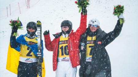 Connor Curran stands on the podium at the 2023 FIS Aerials Junior Ski World Championships in Obertauern, Austria