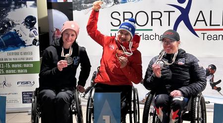 Laurie Stephens smiles on the overall season giant slalom standings podium, finishing third. (U.S Ski & Snowboard). 